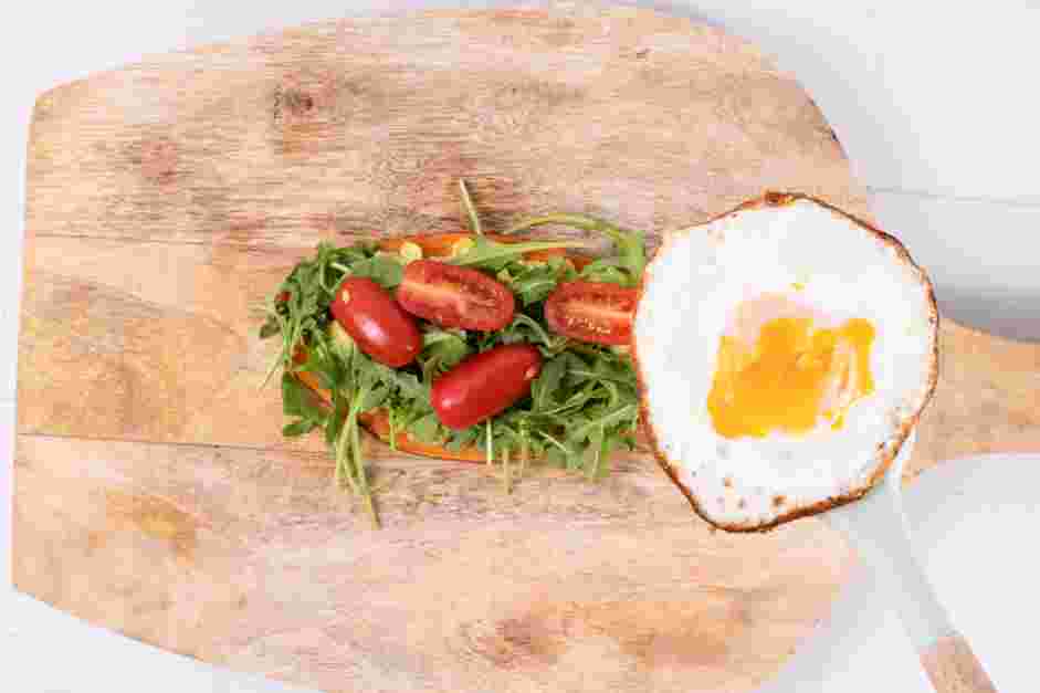 Sweet Potato Toast Recipe: Top the arugula with the pan-fried egg.