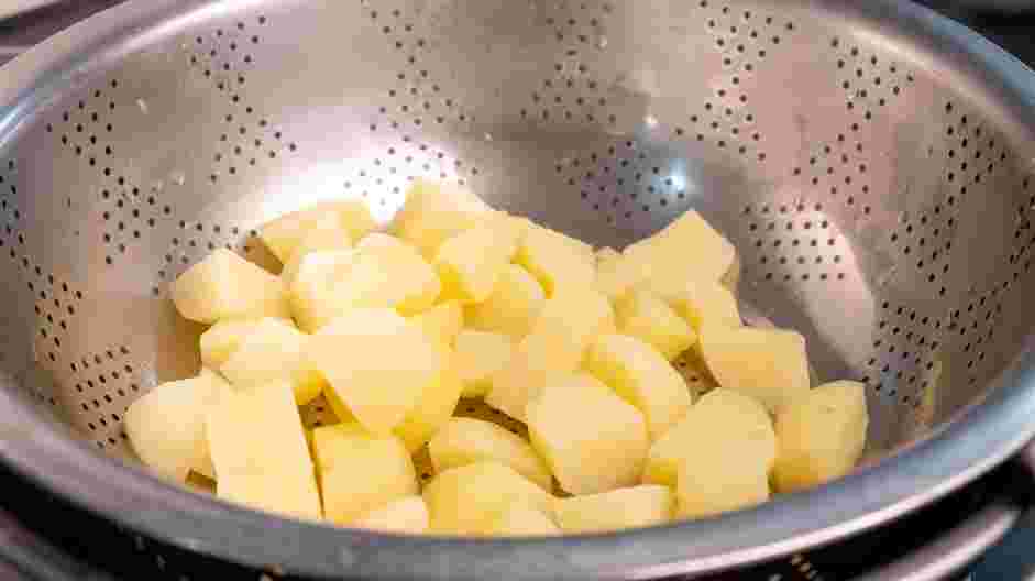 Cheesy Mashed Potatoes Recipe: 
Cook until the potato pieces fall apart when you stab them with a fork, 16-20 minutes.