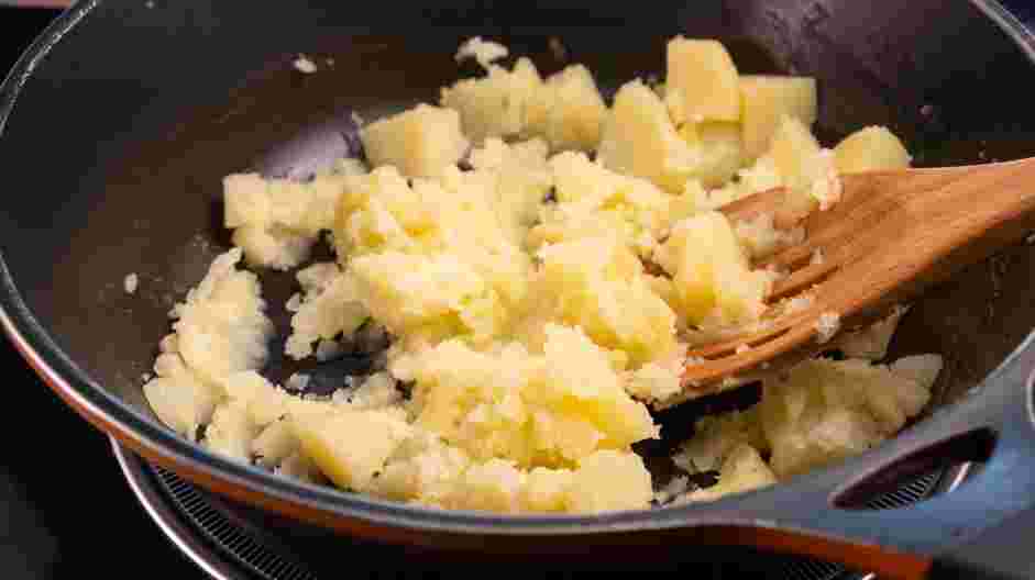 Cheesy Mashed Potatoes Recipe: 
Put the potatoes back in the pot.