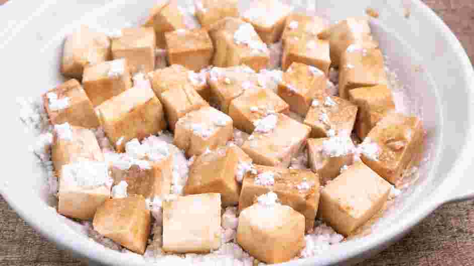 General Tso Tofu Recipe: 
In a large shallow bowl, add &frac14; cup of cornstarch.