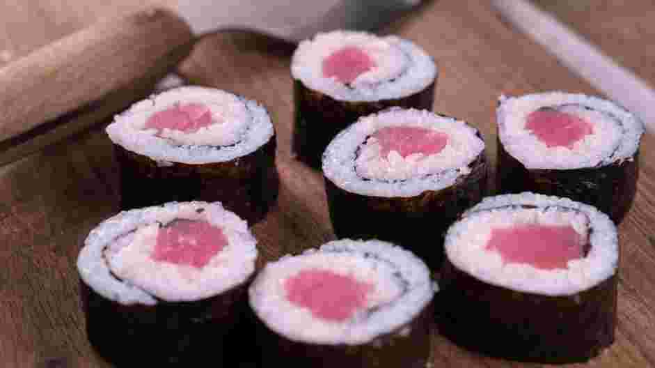 Tuna Roll Recipe: 
Slice the tuna roll in half with a sharp knife.