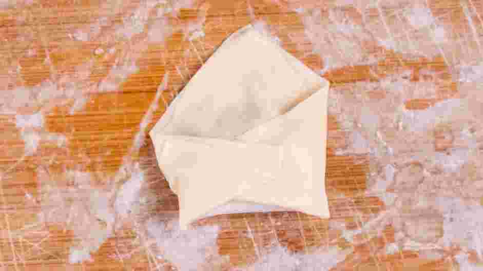 Chicken Wonton Recipe: Fold the wonton into the shape of your choice.