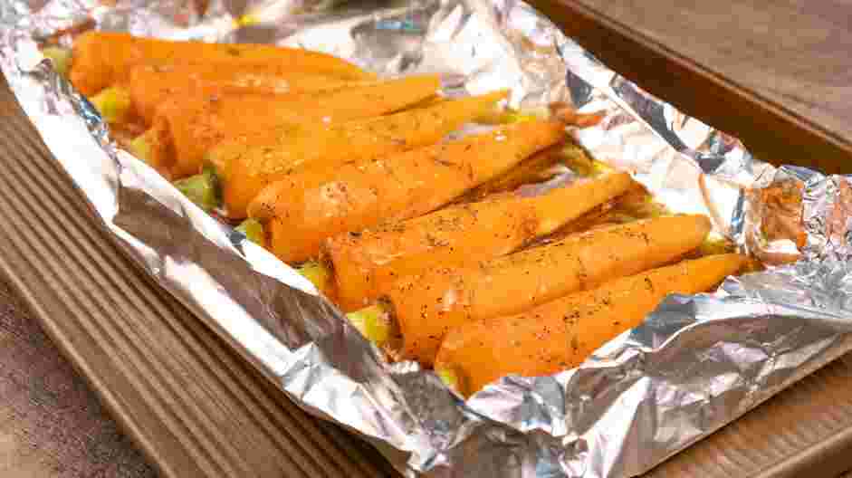 Honey Roasted Carrots Recipe: Turn up the edges of the foil so that the dressing pools under the carrots instead of spreading to the edges of the pan.