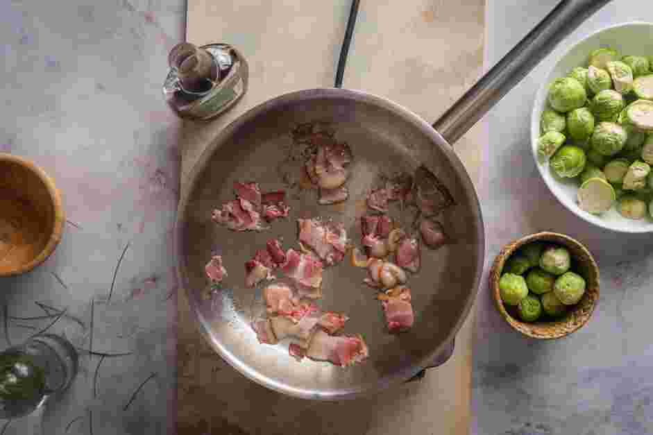 Maple Bacon Brussels Sprouts Recipe: In a skillet over medium-low heat, cook the bacon until crispy and the fat is rendered.