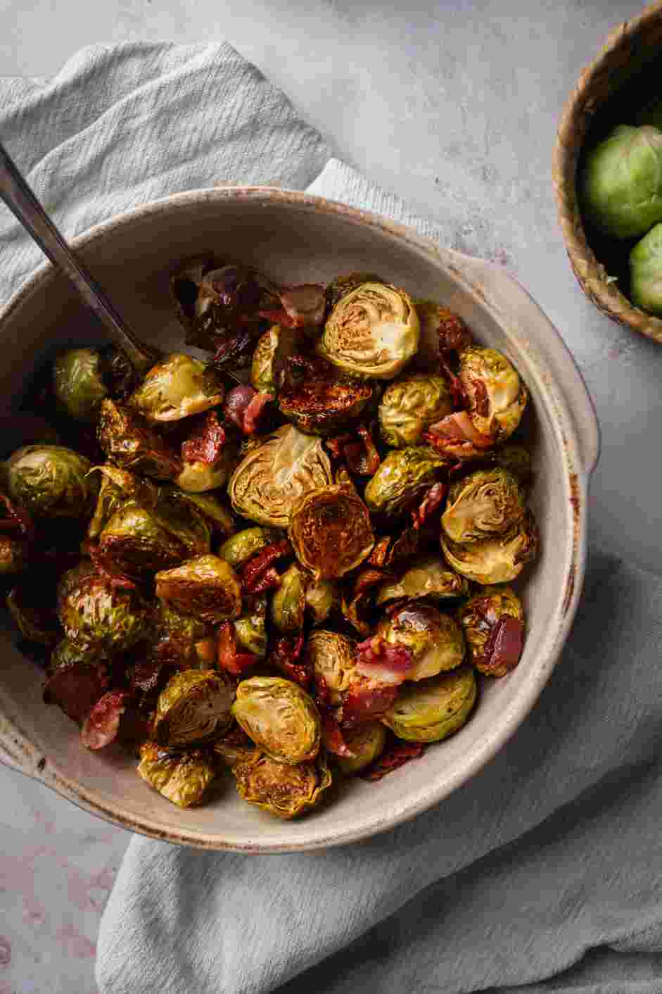 Maple Bacon Brussels Sprouts Recipe: Remove from the oven and toss with the cooked bacon.