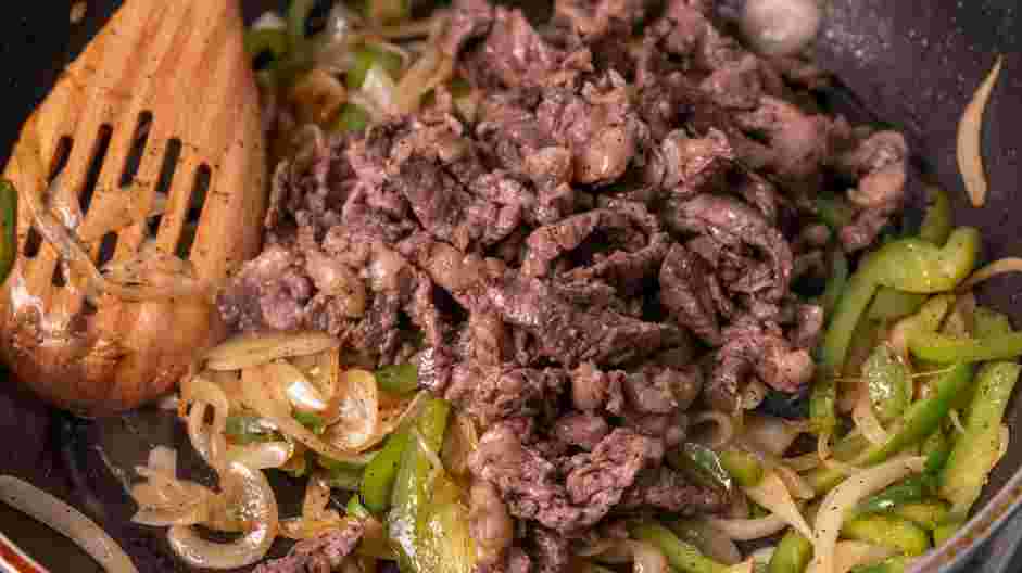 Philly Cheesesteak Sliders Recipe:
Add the steak back to the skillet and cook until heated through, about 2-3 minutes.