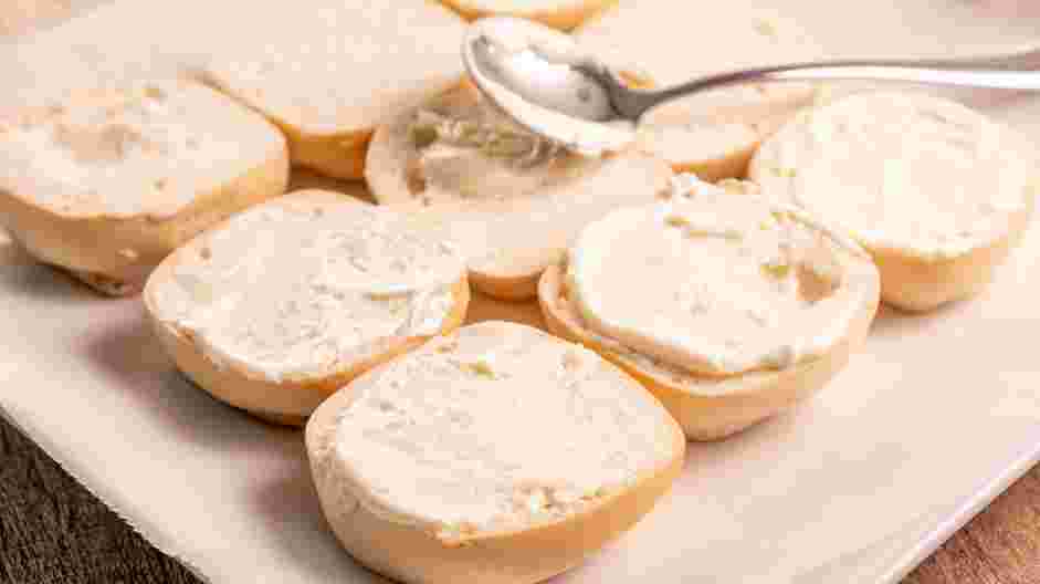 Philly Cheesesteak Sliders Recipe:
Place the bottom half of the rolls into the baking dish.