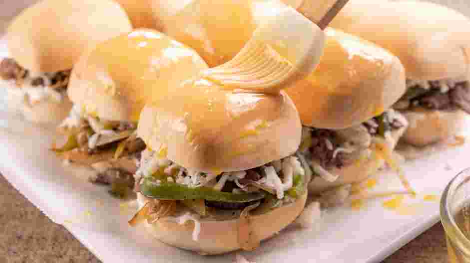 Philly Cheesesteak Sliders Recipe:
Cover with the top half of the rolls.