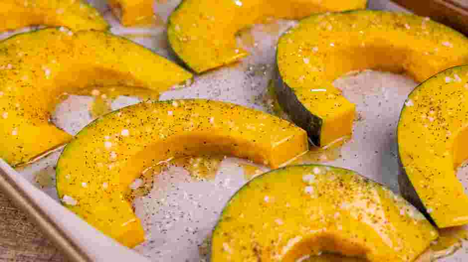 Roasted Kabocha Squash Recipe: 
Place the kabocha squash slices on the baking sheet and toss with avocado oil.