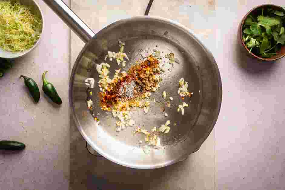 Stuffed Sweet Potatoes Recipe:
Add the garlic, chili powder, smoked paprika, cumin, pepper and salt and cook for about 1 minute.