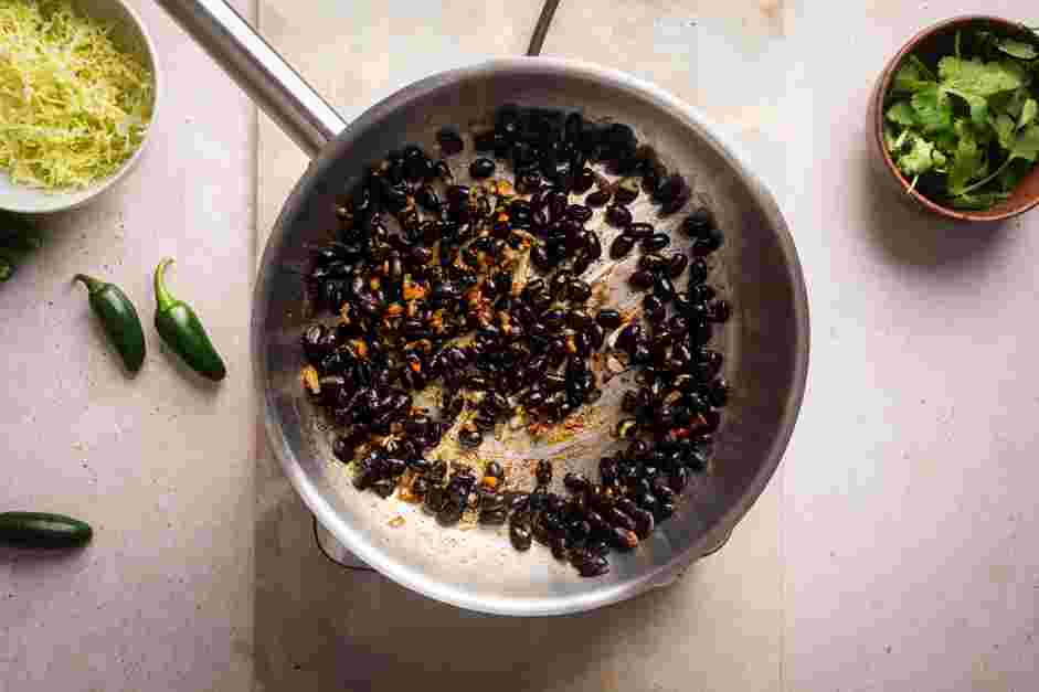 Stuffed Sweet Potatoes Recipe: 
Stir in the rinsed and drained black beans and cook until heated through, about 5 minutes.