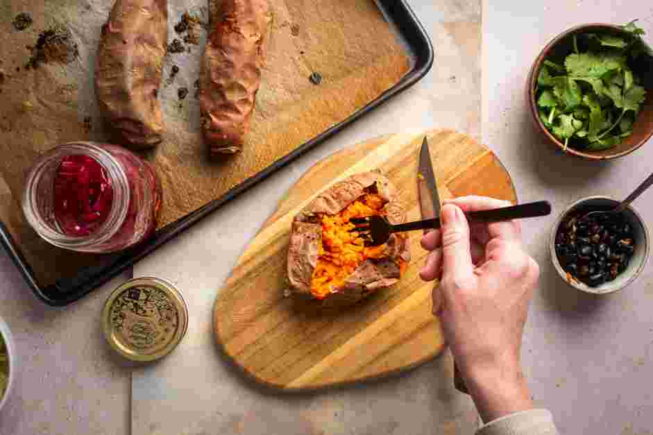 Stuffed Sweet Potatoes Recipe: 
Slice each sweet potato open and use a fork to fluff and separate the sweet potato from the skin.