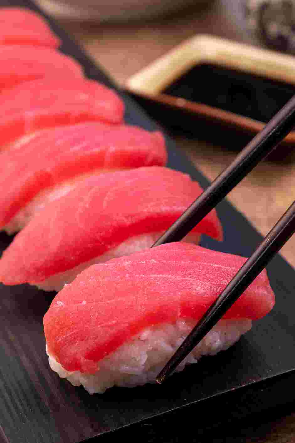 Easy Tuna Nigiri Recipe: Plate by placing a small amount of wasabi and pickled ginger on the right side of your plate.