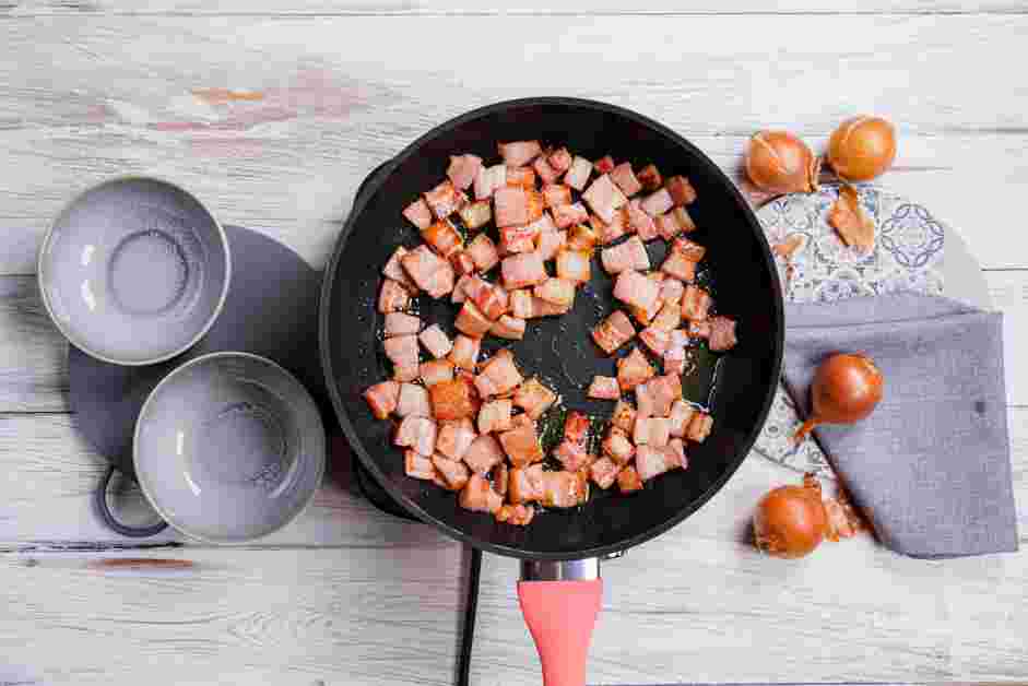 Bacon Onion Jam Recipe: In a medium saute pan over medium heat, pan sear the pieces of bacon until browned, about 7-8 minutes.