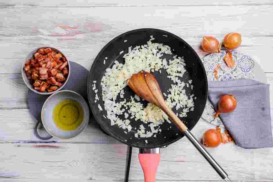 Bacon Onion Jam Recipe: Add the minced garlic and saut&eacute; for 1 minute.