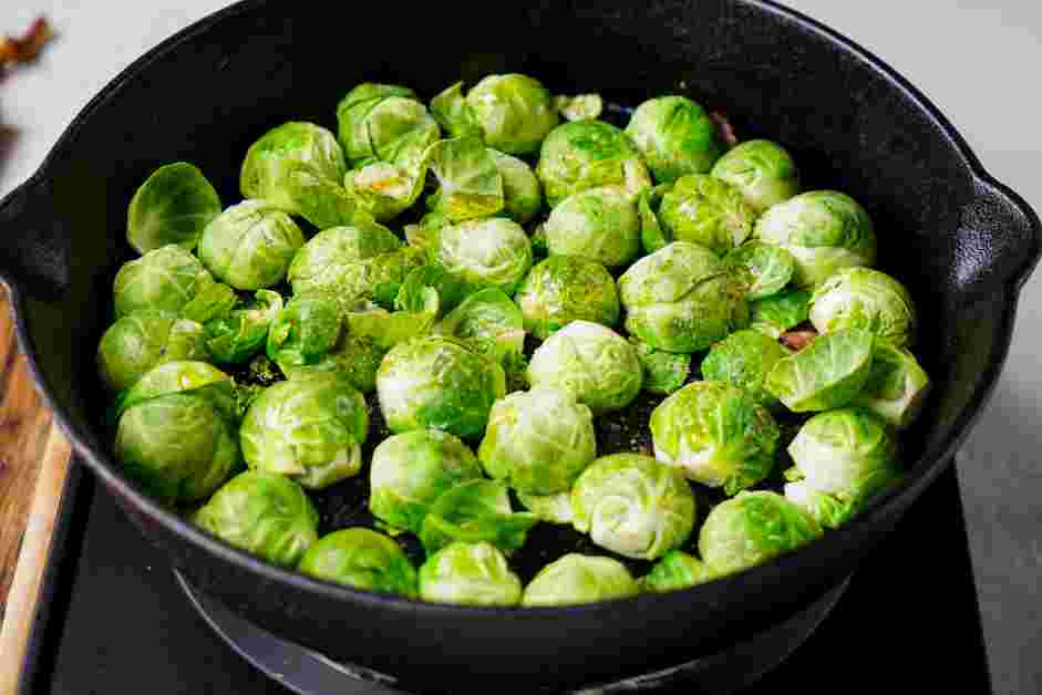 Brussels Sprouts and Bacon Recipe: Drizzle the oil over them and season with a big pinch of salt and several grinds of pepper.