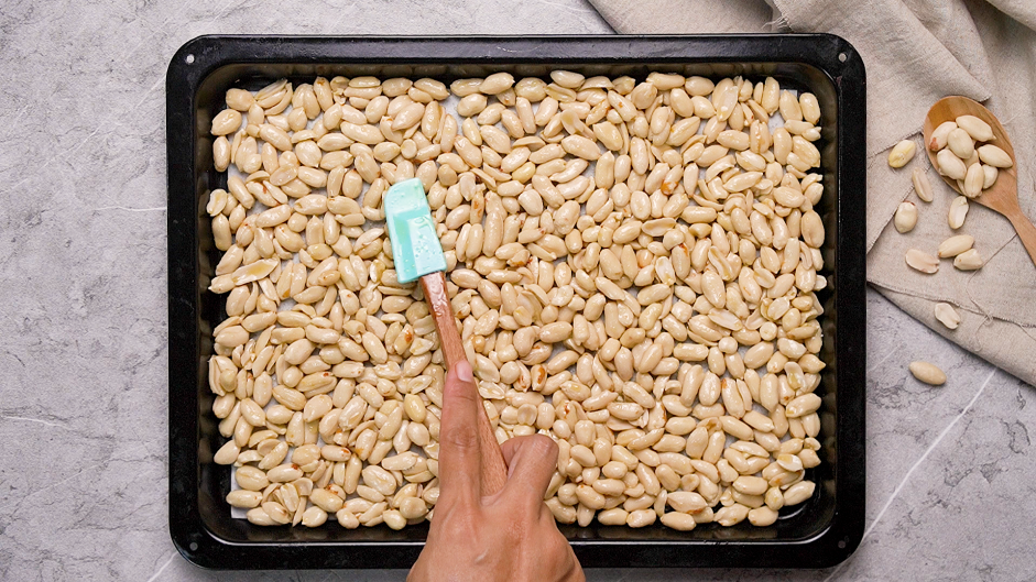 Honey Roasted Peanuts Recipe: 
Transfer the peanuts to the prepared baking sheet, Make sure to spread out the peanuts in one even layer.