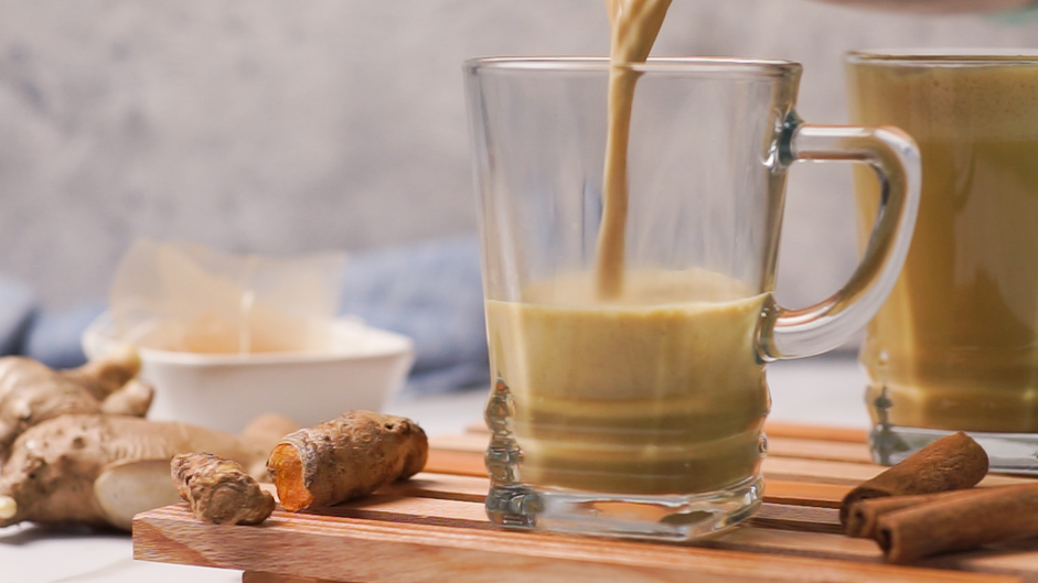 Turmeric Latte Recipe: Pour into two mugs.