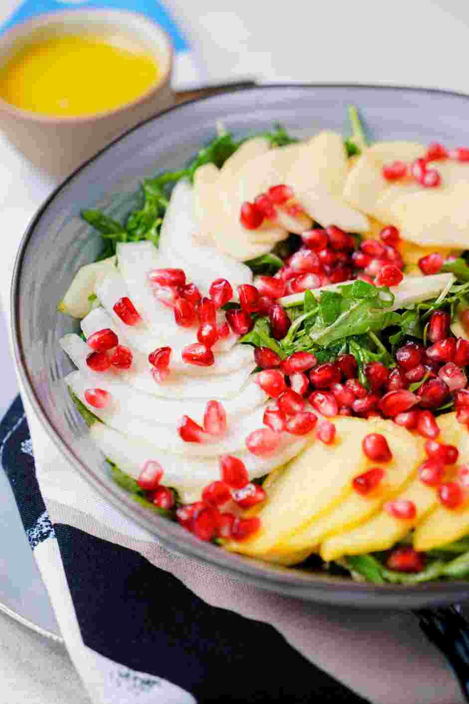 Harvest Salad Recipe: Sprinkle the pomegranate seeds and serve with the extra dressing on the side.