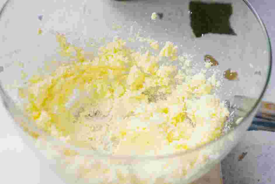 Snowball Cookies Recipe: In the bowl of a standing mixer fitted with a paddle attachment or with an electric hand mixer, beat the butter and the sugar together on medium speed until lighter in color and fluffy, about 5 minutes.