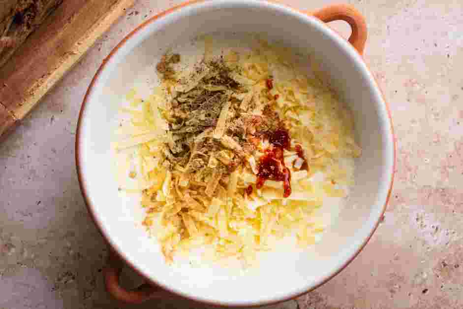 Fried Mac and Cheese Recipe: 
Grease and line a 9x9-inch pan with parchment paper and set aside.