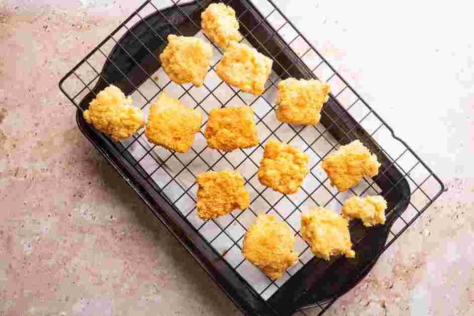 Fried Mac and Cheese Recipe: Set the fried cubes on the prepared wire rack.