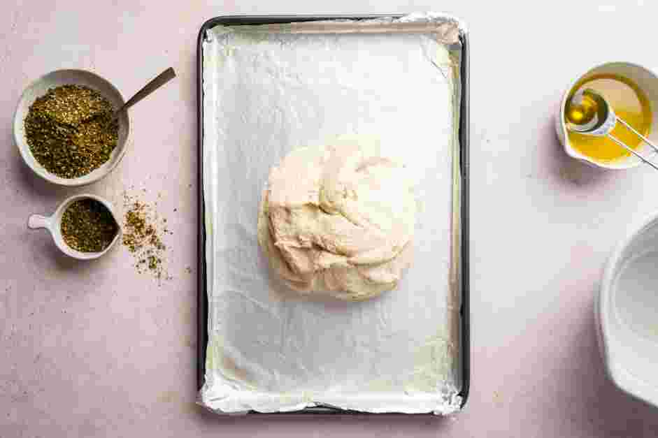 Zaatar Bread Recipe: 
Line a baking sheet with aluminum foil, shiny side down.