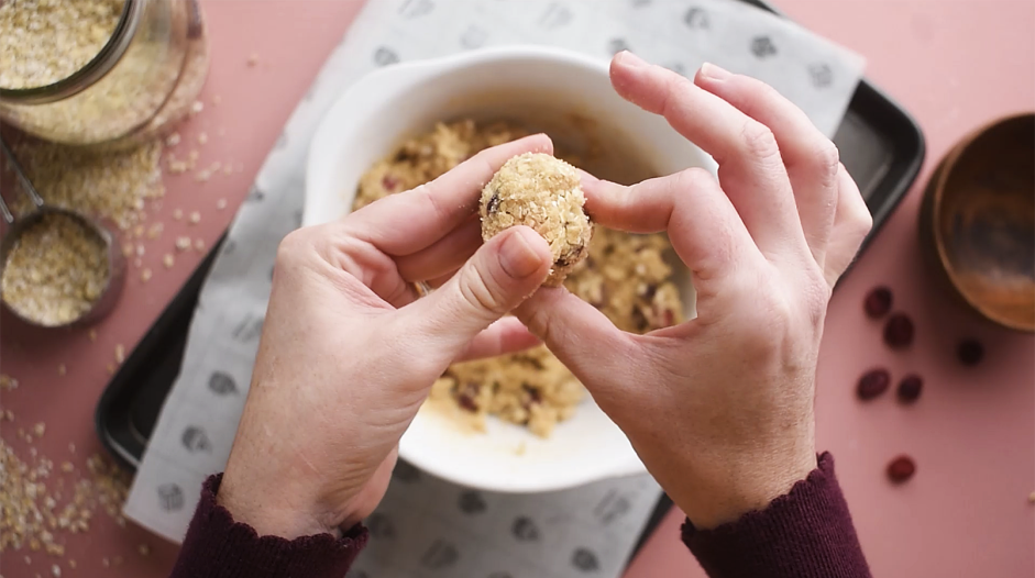 Oatmeal Cranberry Cookies Recipe: 
Roll a heaping tablespoon of dough into a ball and place it on the prepared sheet pan.