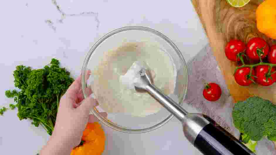 Broccoli Bacon Salad Recipe: In the bowl of a food processor, place the mayonnaise and crumbled blue cheese and blend until smooth.