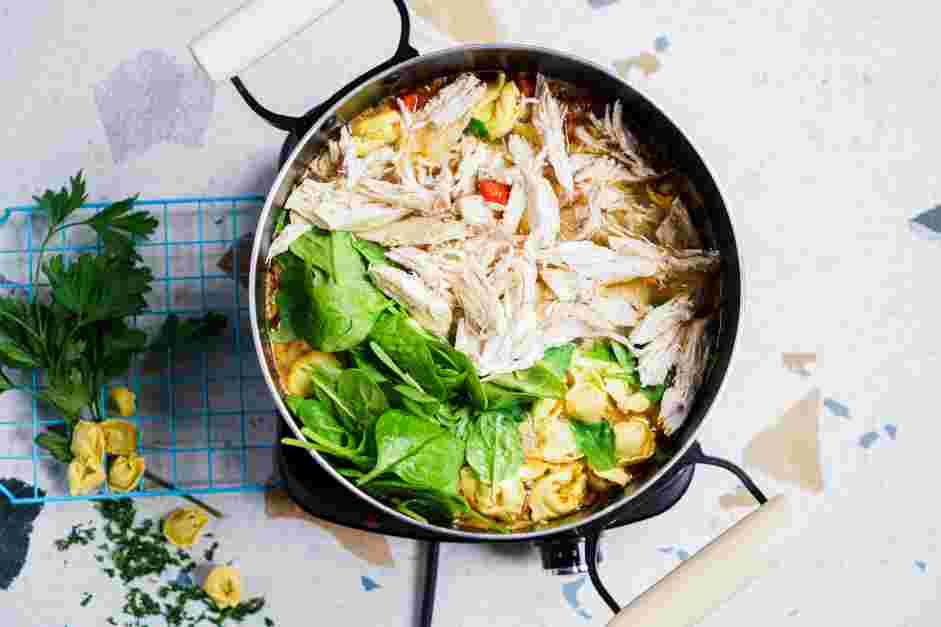 Chicken Tortellini Soup Recipe: 
One minute before the tortellini is cooked, stir in the spinach and the shredded chicken.