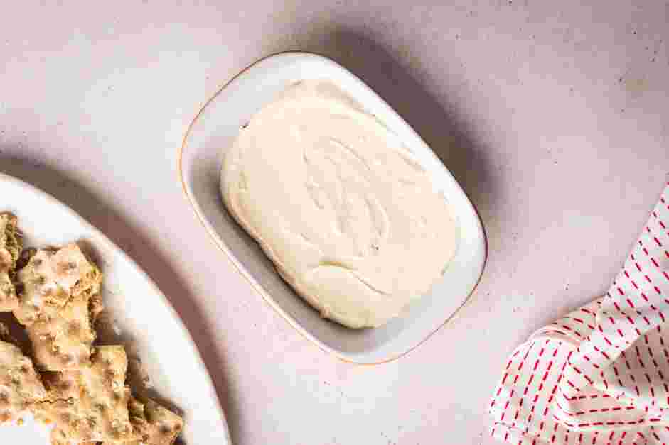 Cranberry Jalapeno Dip Recipe: In a large plate or shallow bowl, spread the cream cheese mixture evenly, about 1&frac12;-inches thick.