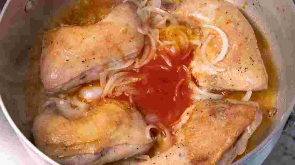 Braised Chicken Thighs Recipe:
Return all the chicken pieces to the pot and add the onion, garlic, saffron mixture and tomato paste mixture.