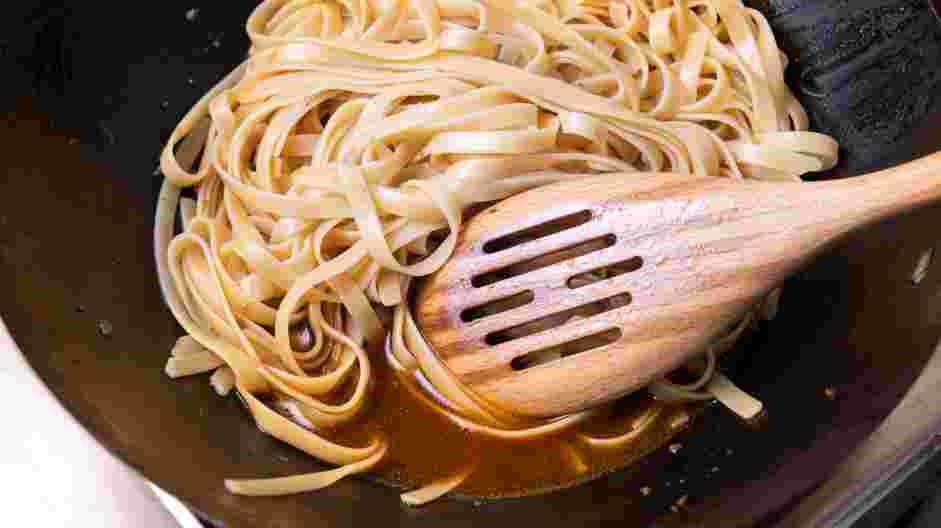 Beef Pad Thai Recipe:
Add the drained rice noodles and the reserved sauce and cook, continuously turning the noodles.