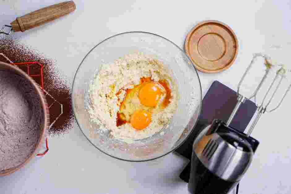 Red Velvet Whoopie Pie Recipe:
Add the egg, egg yolk, vanilla extract and apple cider vinegar.