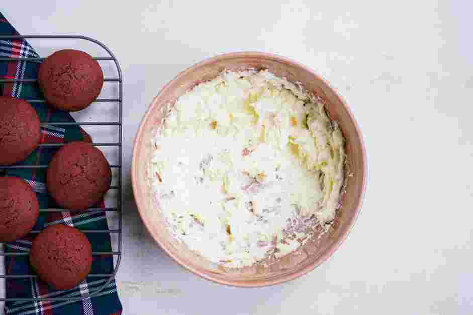 Red Velvet Whoopie Pie Recipe: 
While the whoopie pies are cooling, make the cream cheese frosting.