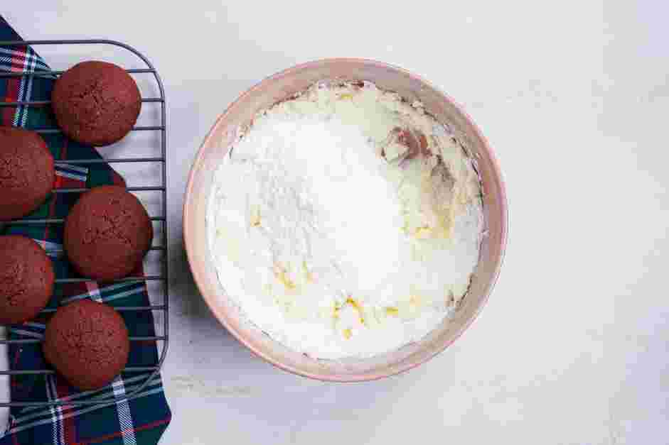 Red Velvet Whoopie Pie Recipe: On low speed, add in 2 cups of confectioners’ sugar and then raise the speed to medium.