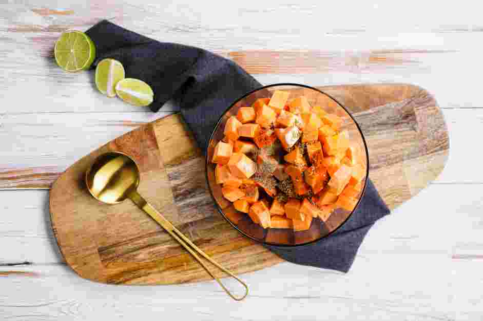 Sweet Potato Black Bean Tacos Recipe:
In a large bowl, combine the potatoes with olive oil, chili powder, smoked paprika, garlic powder, oregano, salt and pepper.