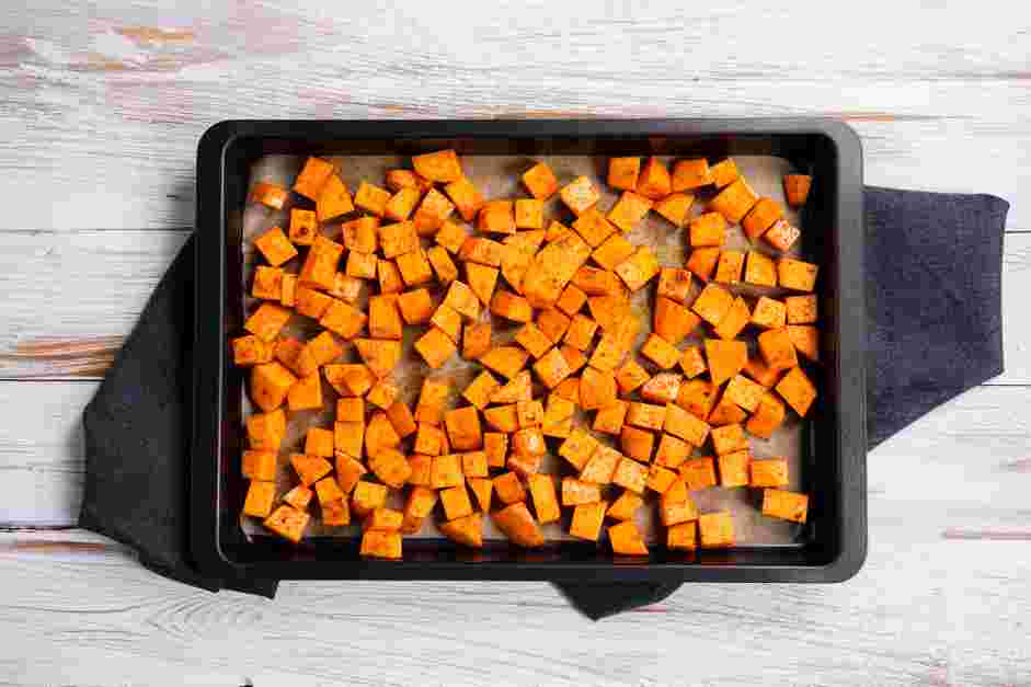 Sweet Potato Black Bean Tacos Recipe: 
Spread the potatoes in a single layer on the prepared baking sheet and bake for 30-40 minutes, rotating the pan halfway through, until the sweet potatoes are tender and a fork or knife inserted in the center easily slides through.