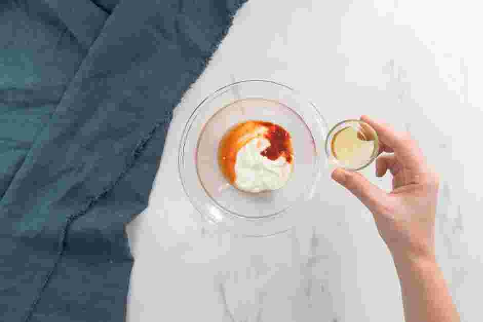 Cod Fish Tacos Recipe:
Make the Sriracha crema, whisk together the Mexican crema, Sriracha, vinegar, honey, salt and pepper.