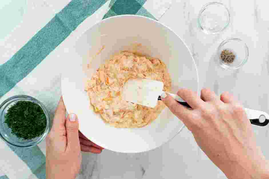 Salmon Rillettes Recipe:
In a bowl, place the cooled poached salmon, smoked salmon, butter, egg yolk and cream.