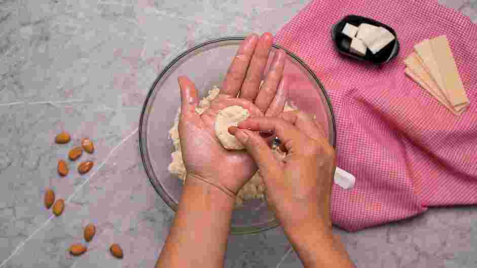 White Chocolate Truffle Recipe:
Create a divot and place an almond in the center.