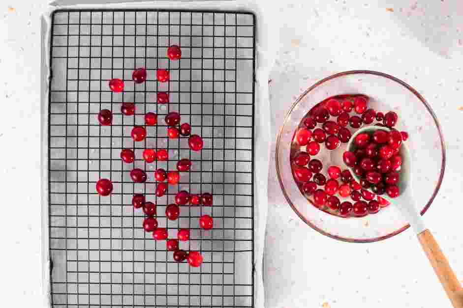 Sugared Cranberries Recipe: 
While the syrup is cooling, line a sheet pan with parchment paper and top it with a wire rack.