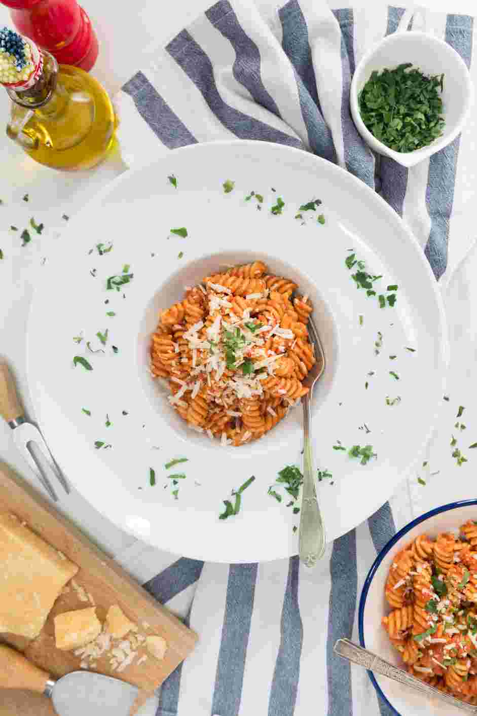 Spicy Vodka Pasta Recipe: Top the pasta with more Parmesan cheese before serving.