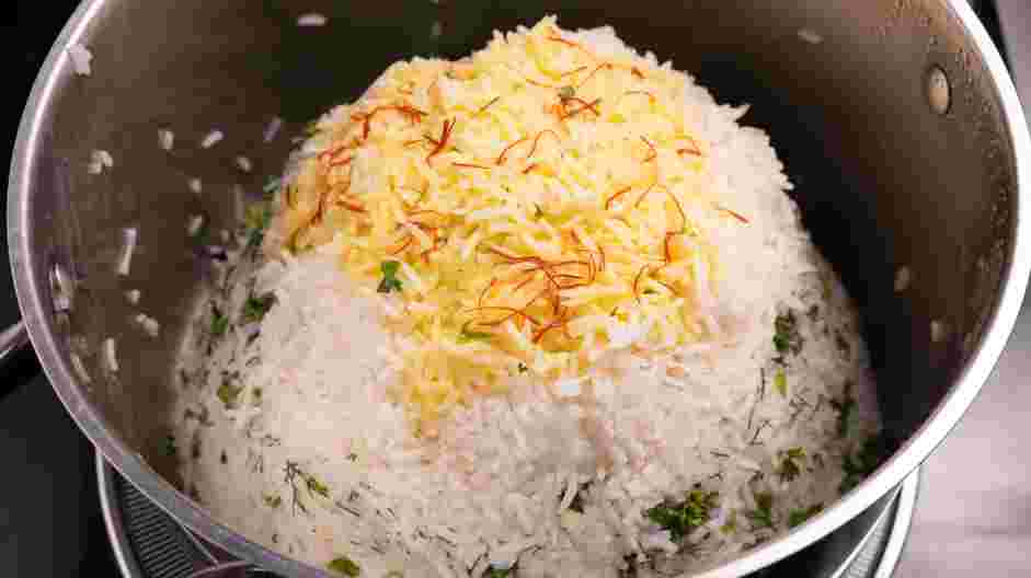 Herb Rice Recipe: In a small bowl, mix the remaining ⅓ cup of butter and saffron mixture.