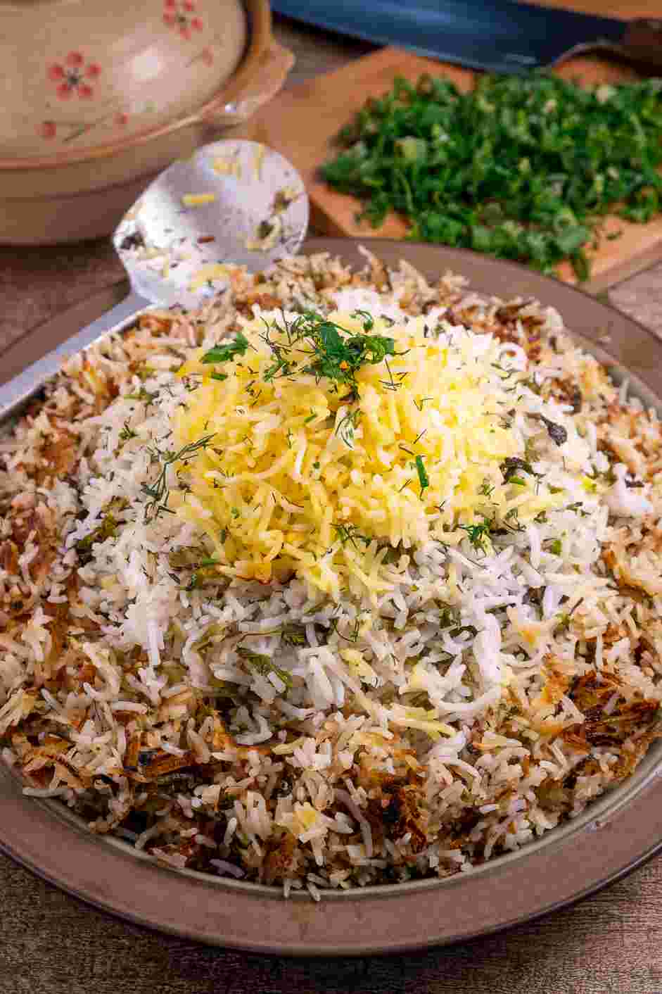 Herb Rice Recipe:
Break the crust (tahdig) on the bottom of the pan into pieces and serve alongside the rice.