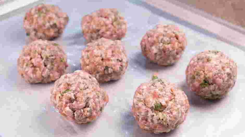 Moo Ping (Thai Pork Skewers) Recipe:
Divide the pork into eight portions.