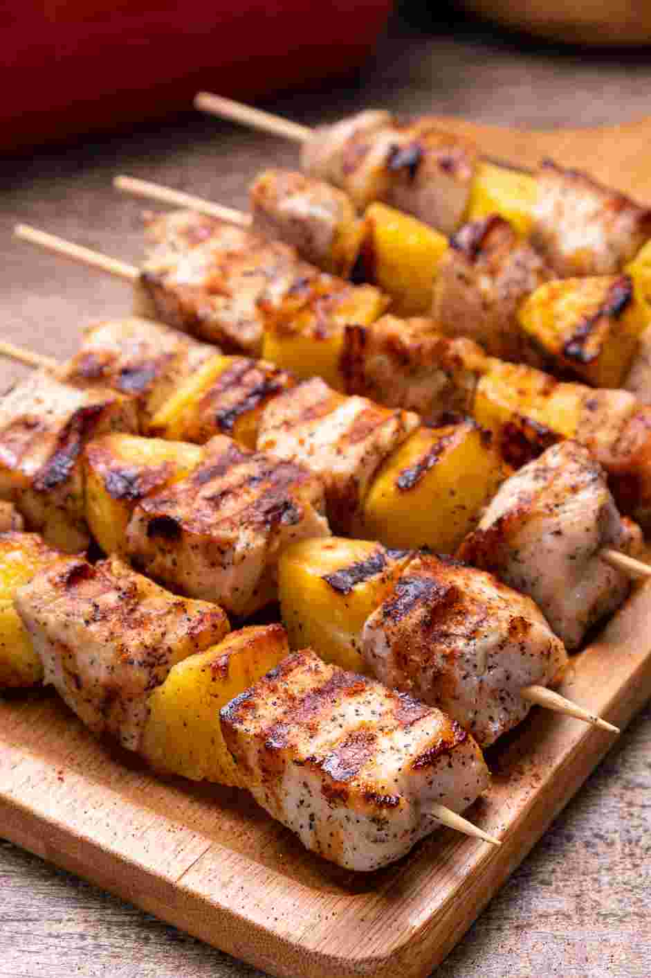 Grilled Pineapple Chicken Recipe:
Place the skewers on a plate or board and lightly sprinkle the chicken and the pineapple with li hing mui powder.