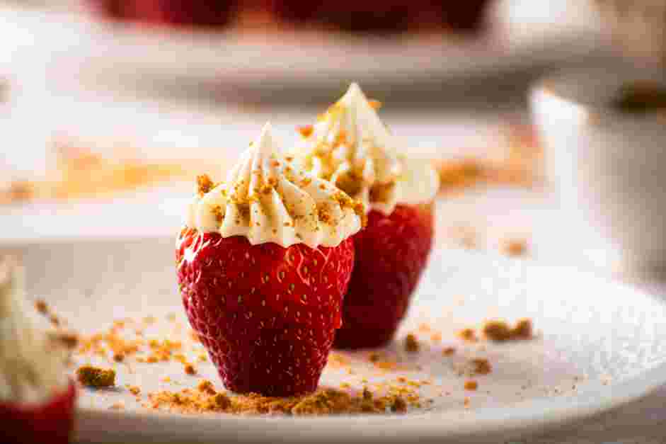 Cheesecake Stuffed Strawberries Recipe: 
Sprinkle the graham cracker crumbs on top.