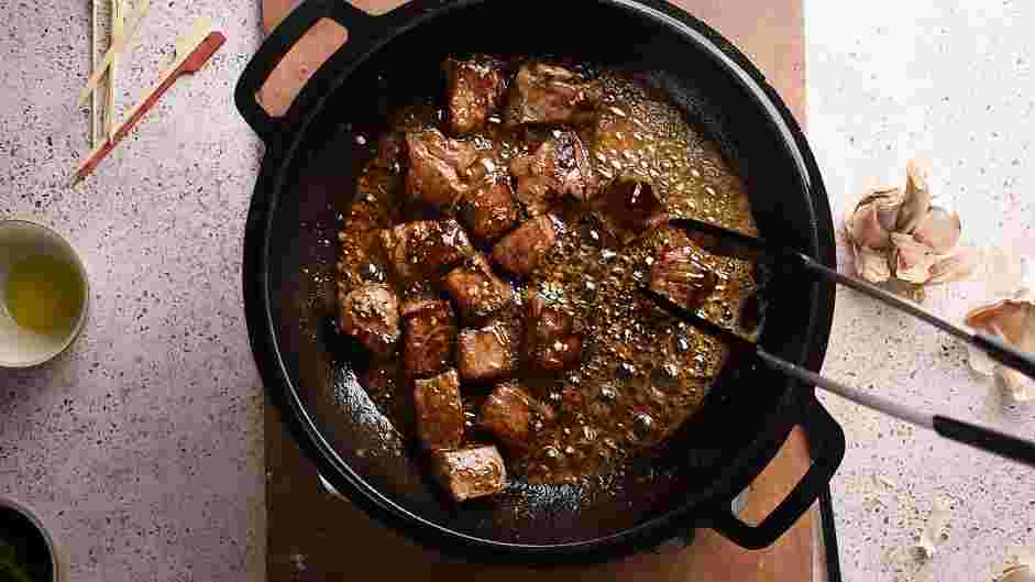 Garlic Butter Steak Bites Recipe: Turn off the heat and add the steak back to the skillet and toss the steak with garlic butter.