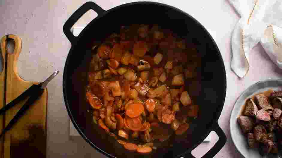 Keto Beef Stew Recipe: Add half of the beef broth, scraping up any browned bits on the bottom of the pan.